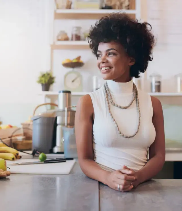 Woman in the kitchen look other way